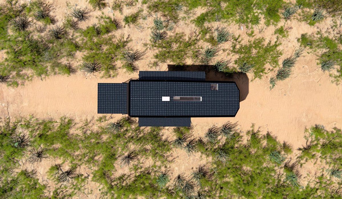 An LV Line trailer seen from above, its roof covered in solar panels